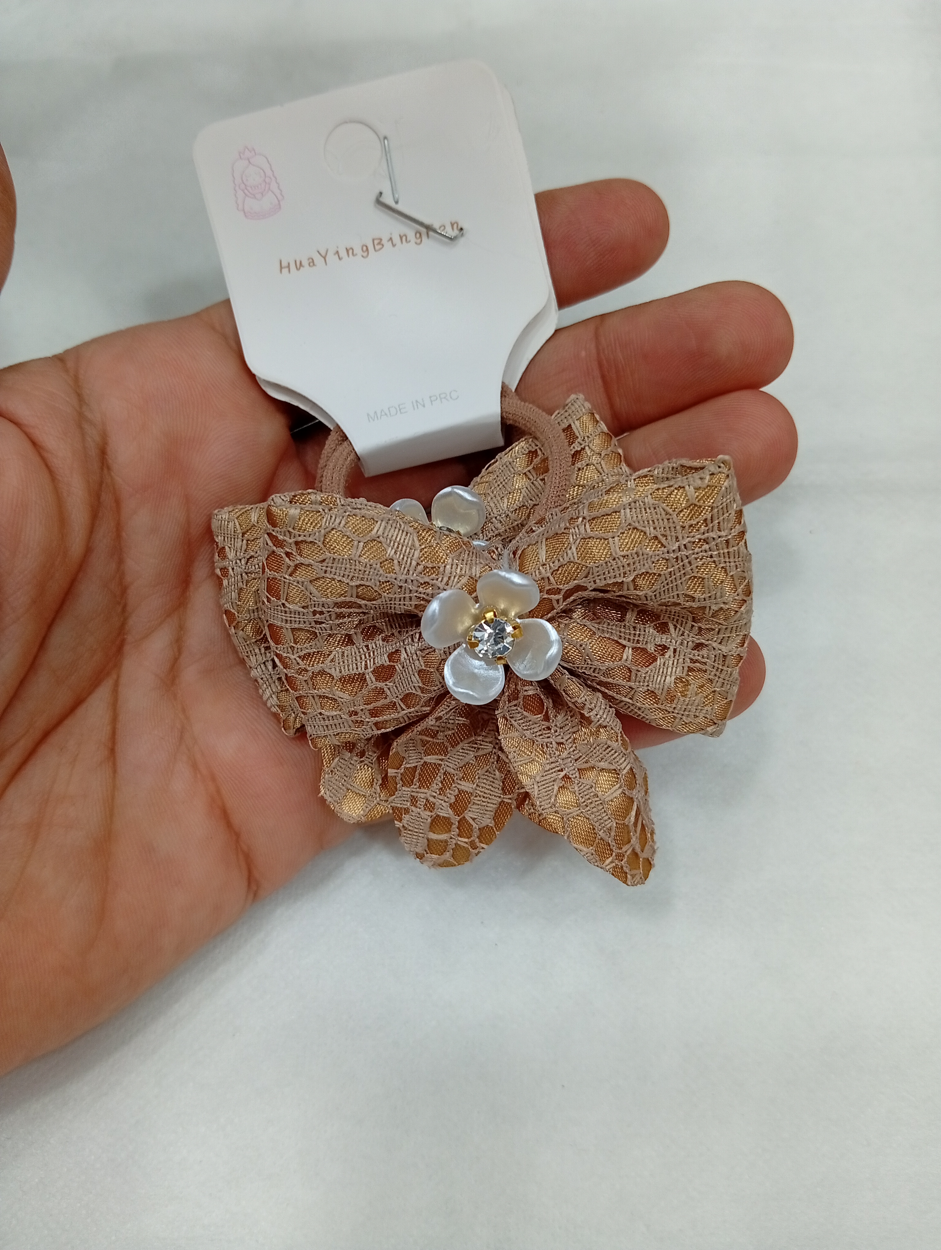 کش موی پارچه ای طرح گل توری نگین دار - 70 تومن - قهوه ای