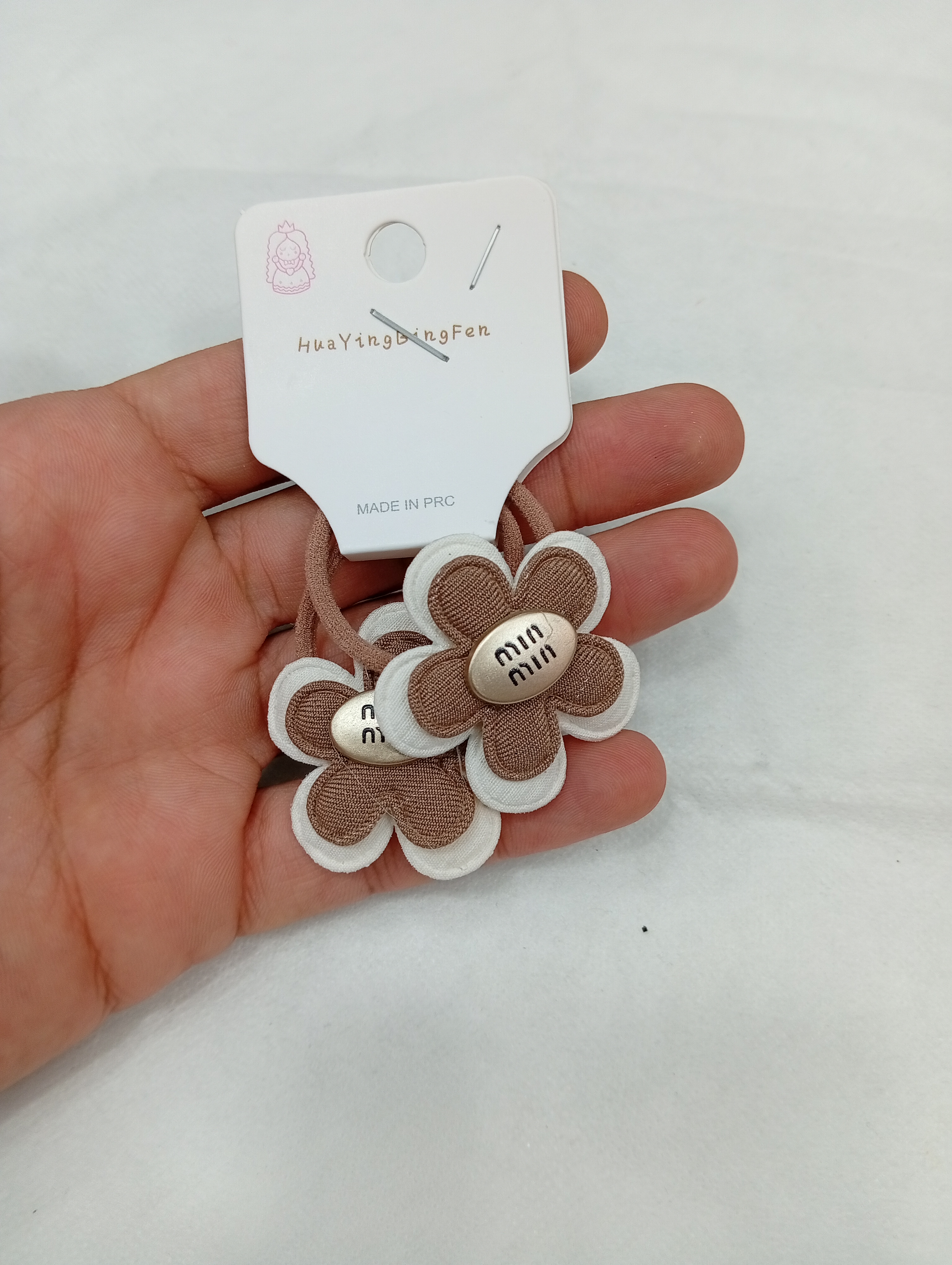 کش موی پارچه ای طرح گل دکمه فلزی - 70 تومن - قهوه ای